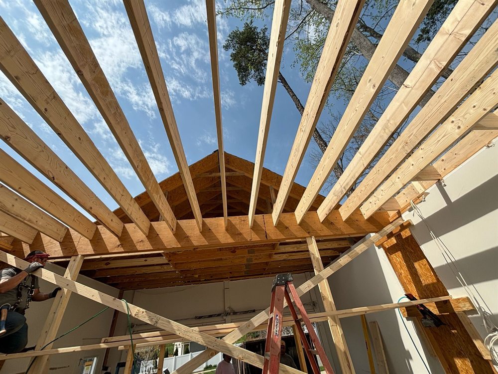 New second-story roof framing going up on the same Davidson garage