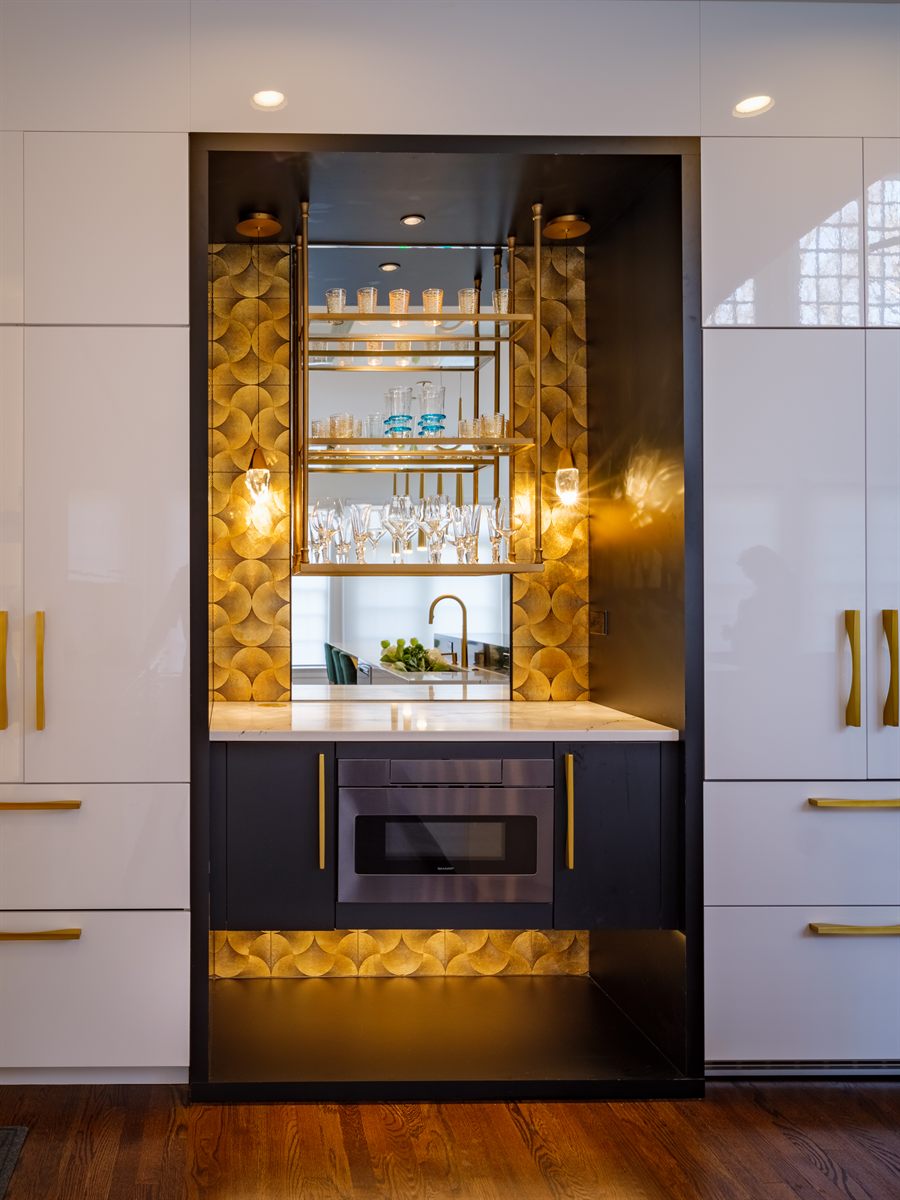 Bar nook in a SouthPark kitchen renovation by Revival Construction: gold scalloped tile, brass shelving and glossy white custom cabinetry