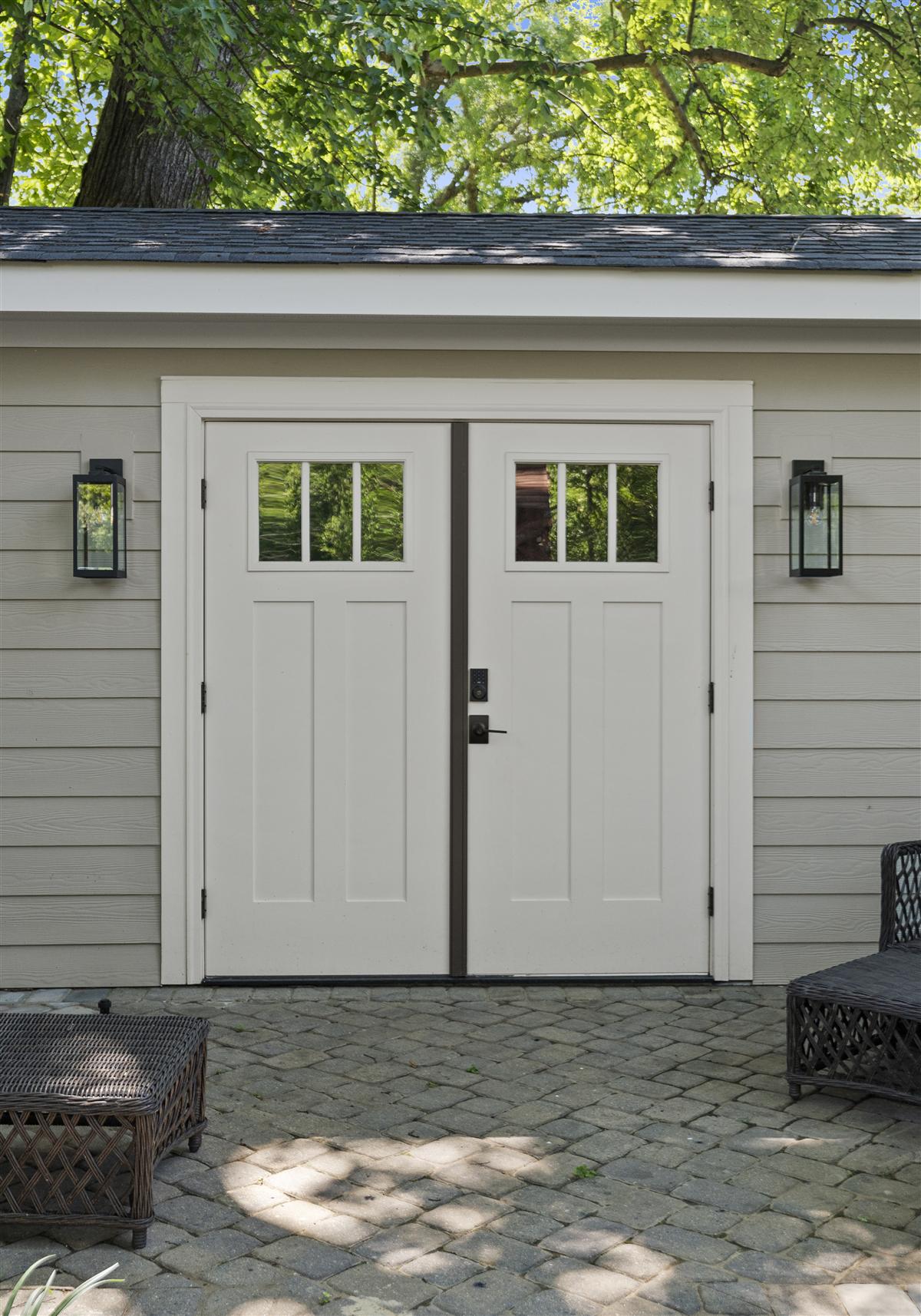 French doors with lantern sconces on the guest studio, Charlotte ADU