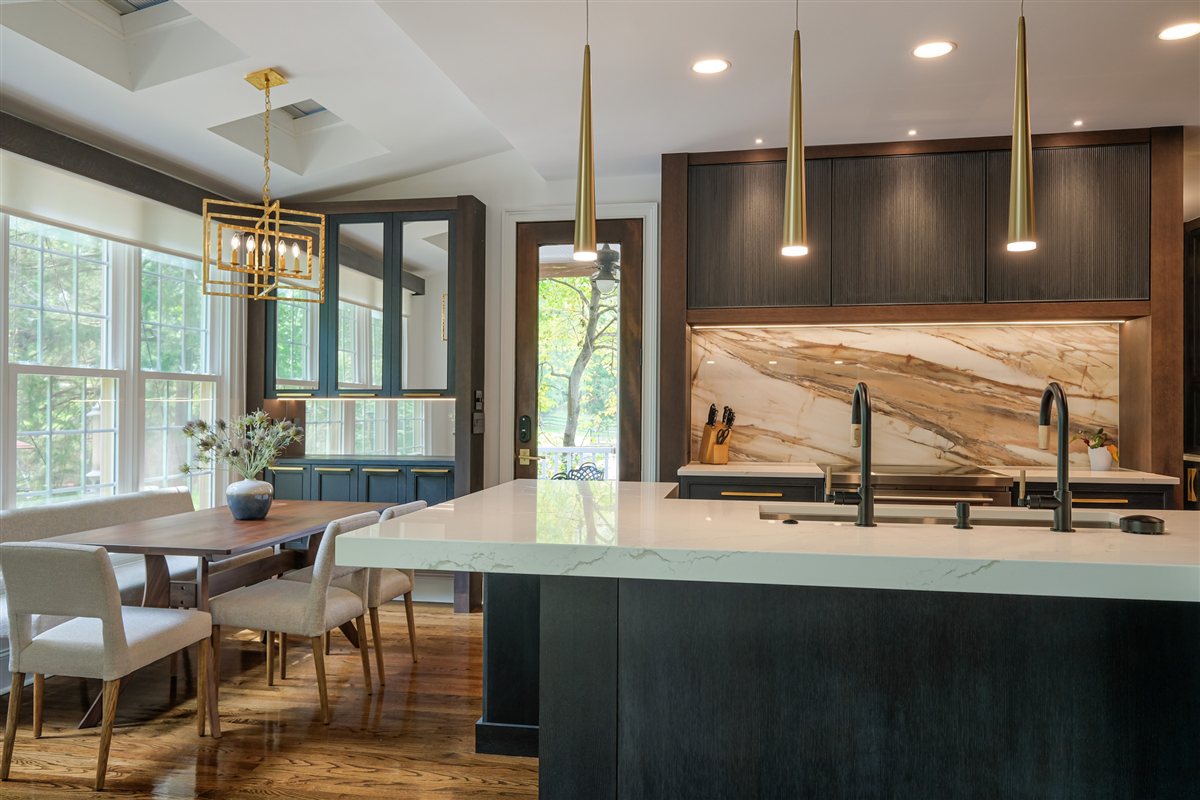 Kitchen island and breakfast room with brass pendants, Charlotte chef's kitchen