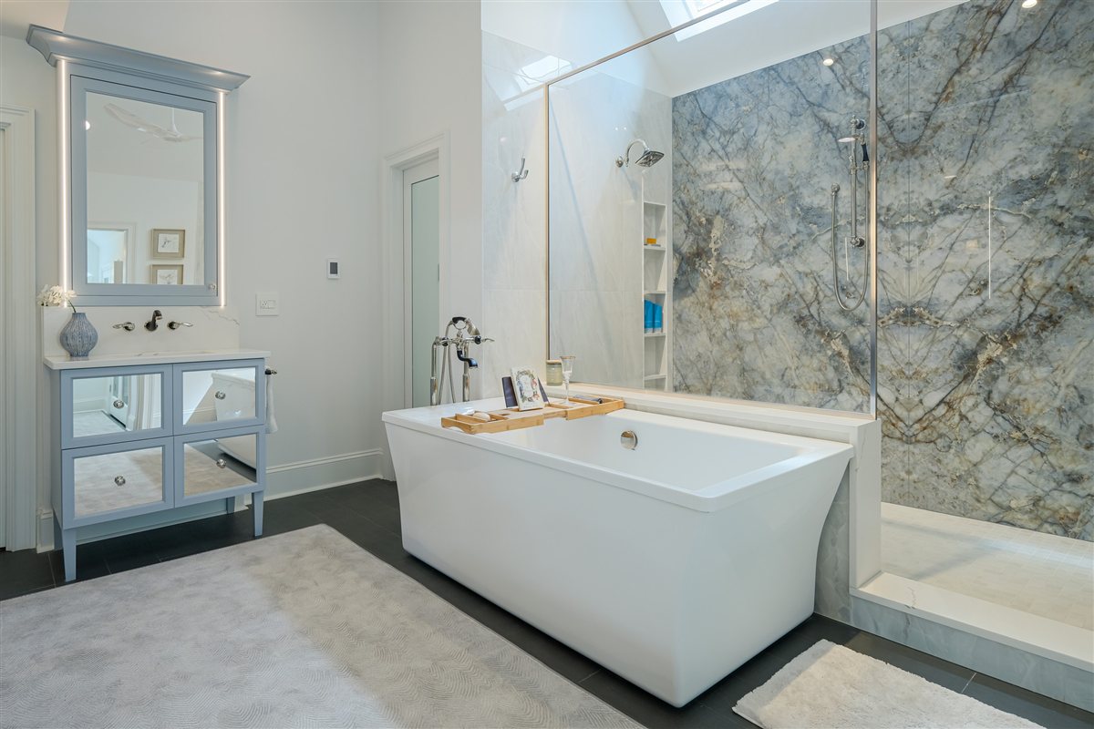 Freestanding tub with a mirrored vanity, Charlotte spa bath