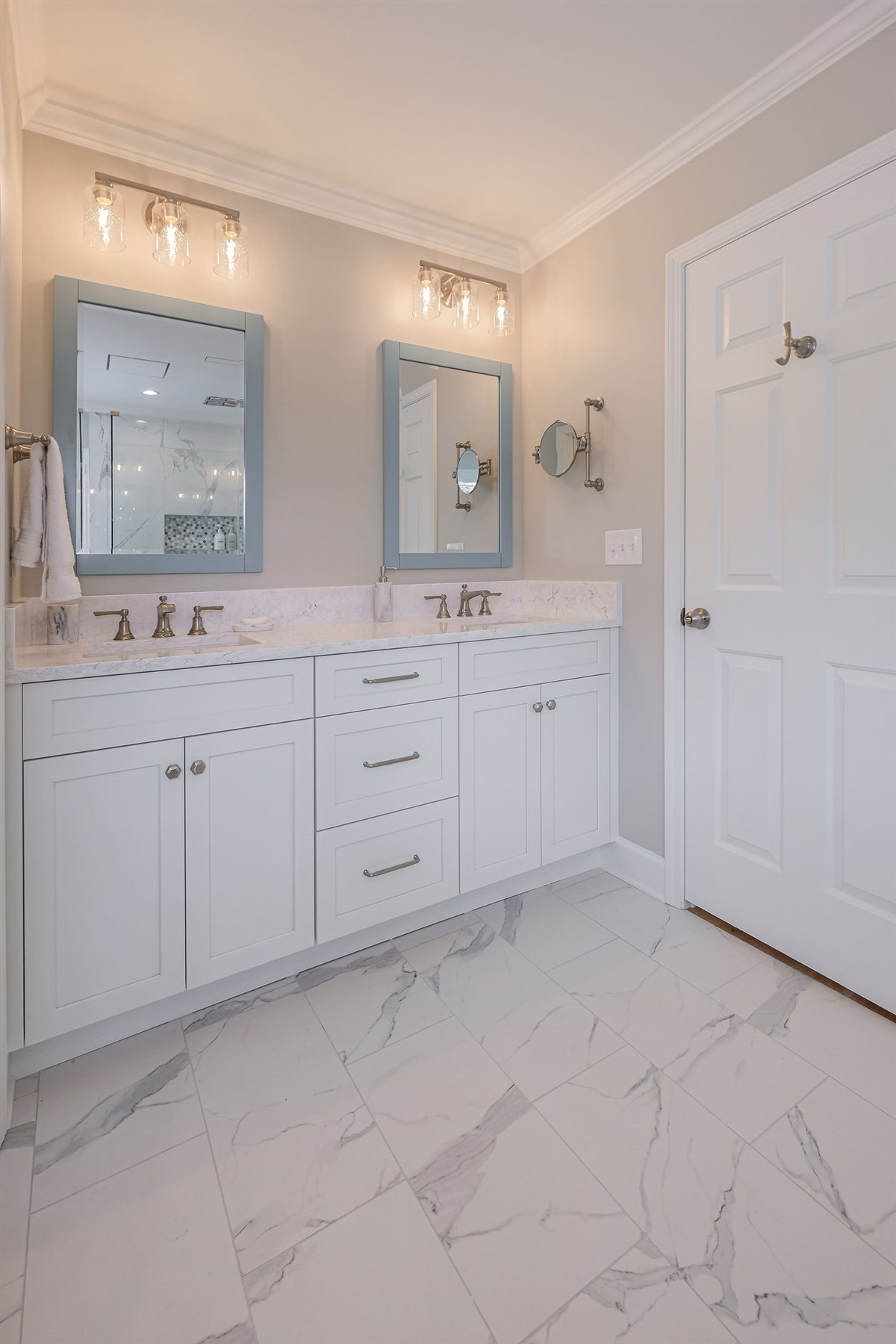 Bath vanity with sconces, Peninsula townhouse renovation