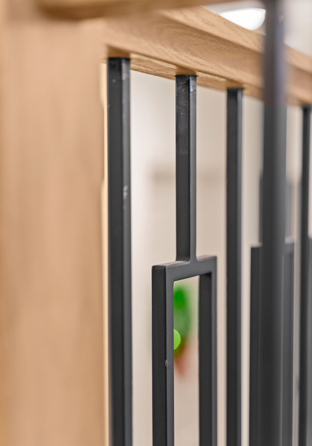 Black geometric baluster detail, River Chase renovation