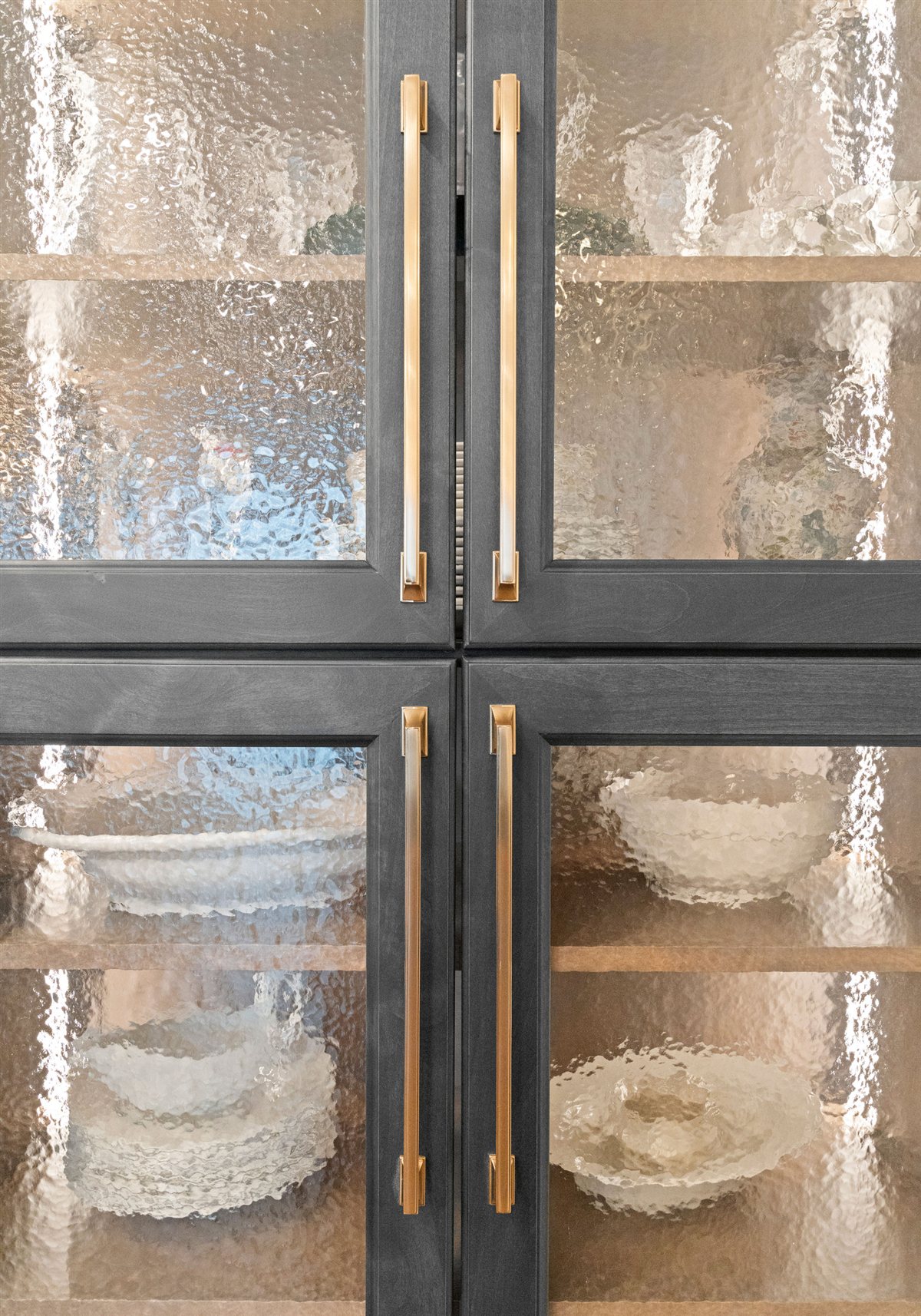 Glass-front cabinets with textured glass, River Chase kitchen