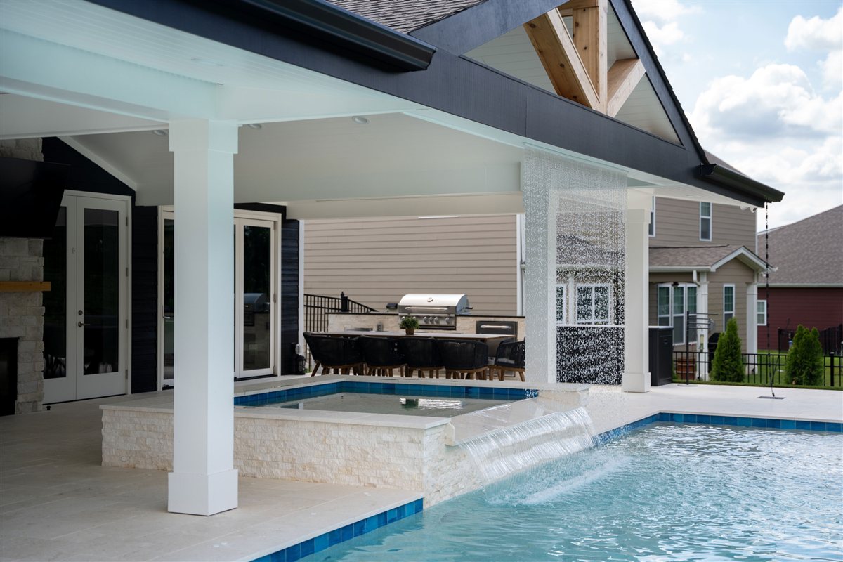 Porch columns framing the raised spa and pool, Denver outdoor living