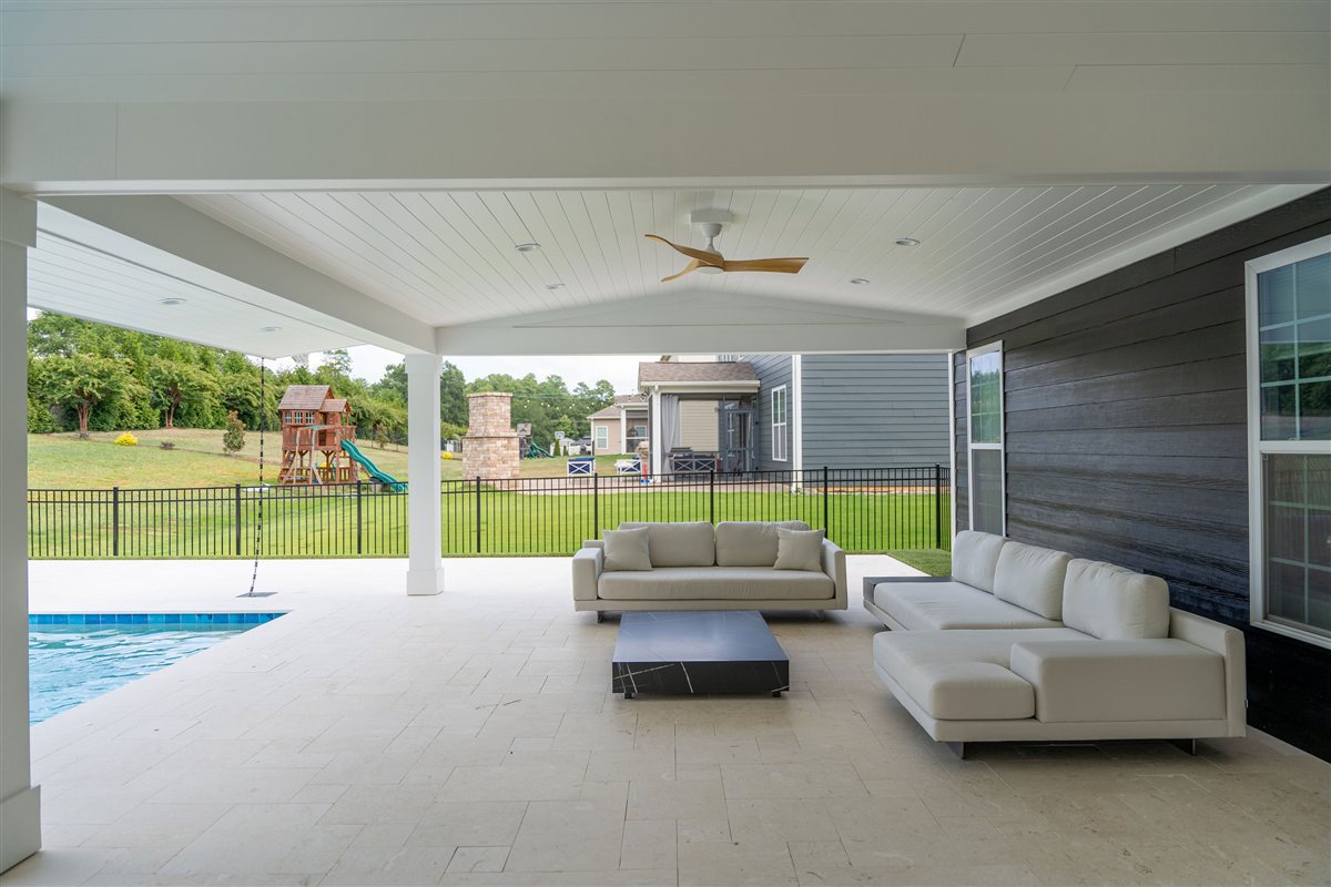 Covered porch looking out to the yard and pool, Denver outdoor living