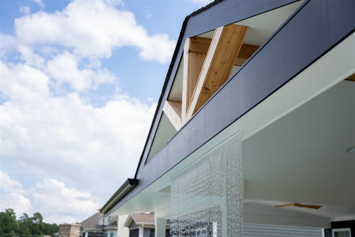 Porch gable and rain curtain from below, Denver outdoor living