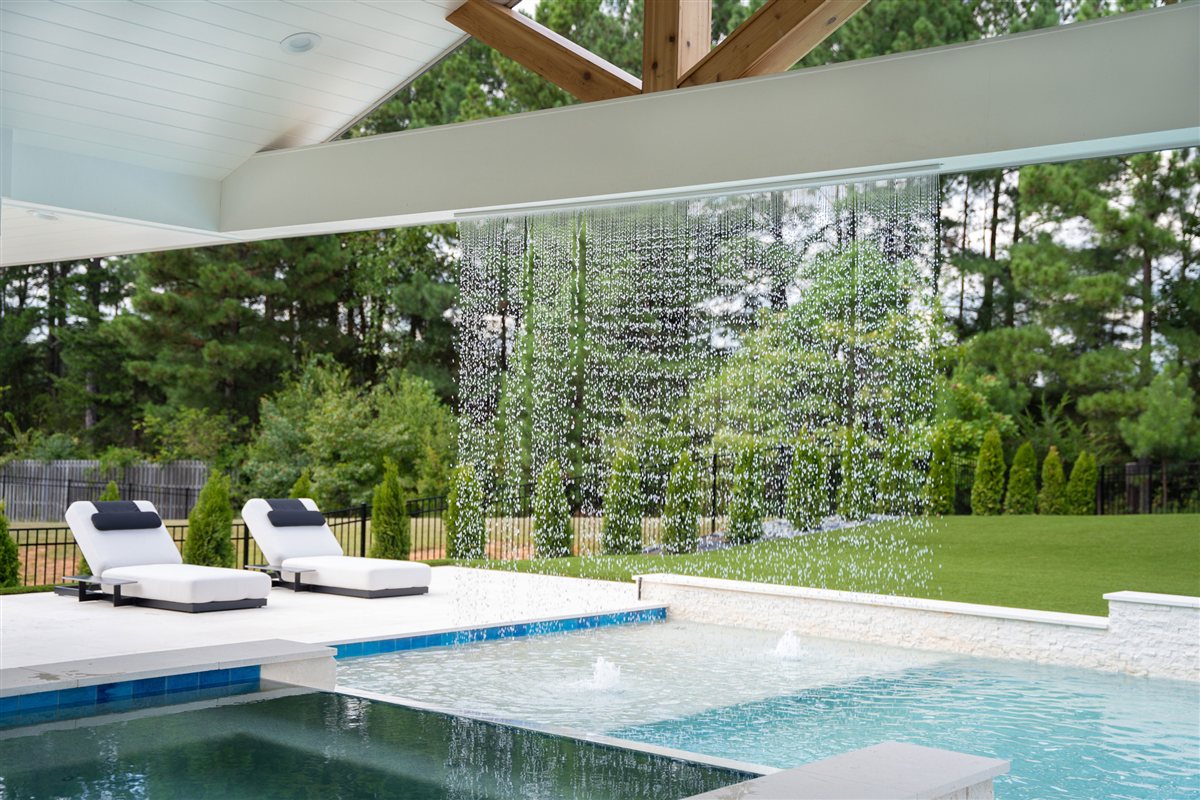 Pool, spa and yard framed by the porch, Denver outdoor living