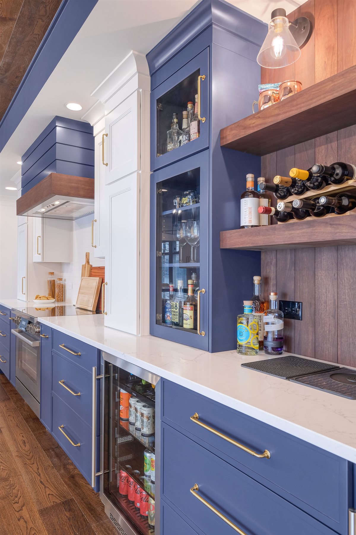 Blue cabinetry and a wood-lined coffered ceiling, Moss Lake kitchen renovation in Kings Mountain