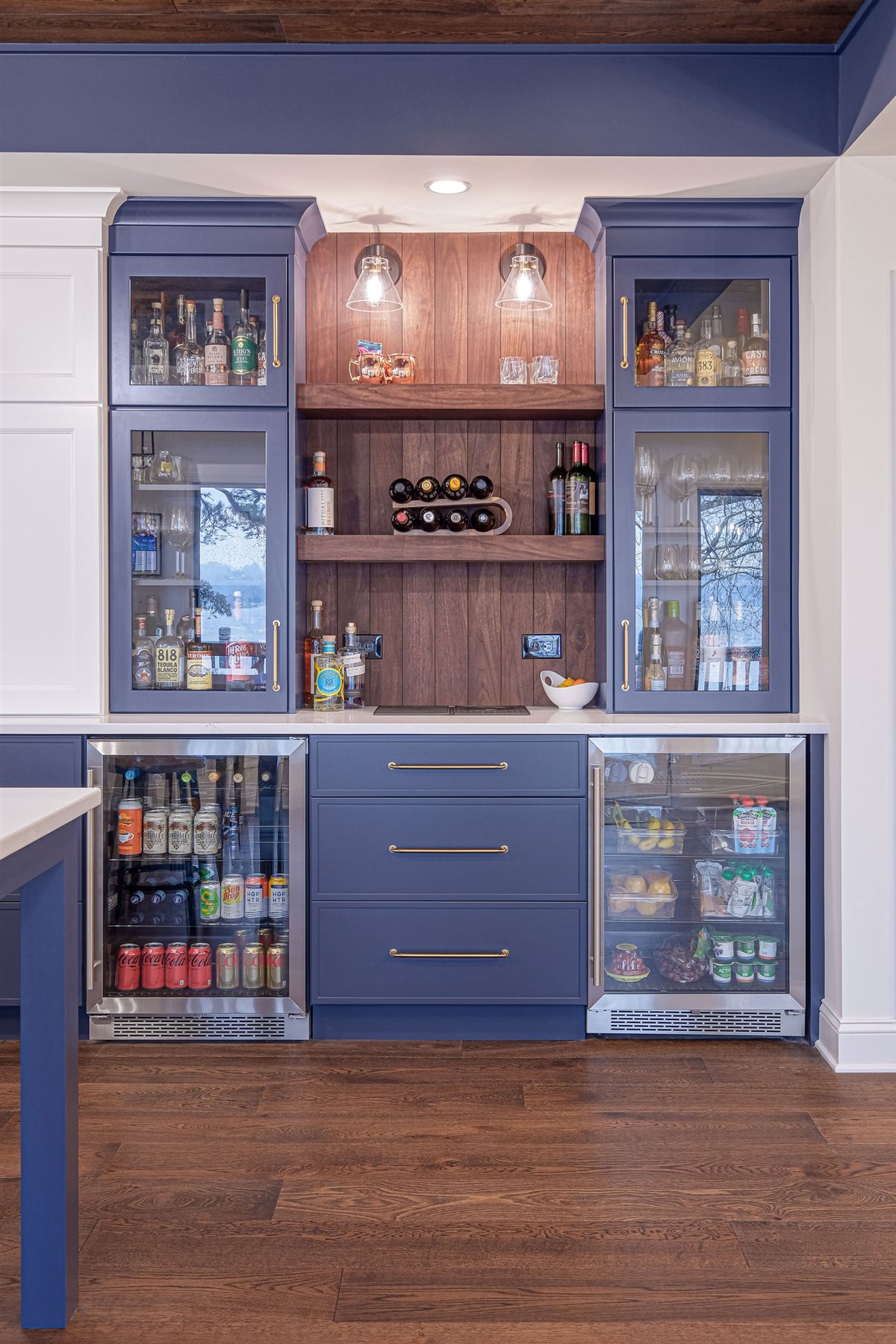 Blue bar cabinet with glass doors and wine storage, Moss Lake kitchen