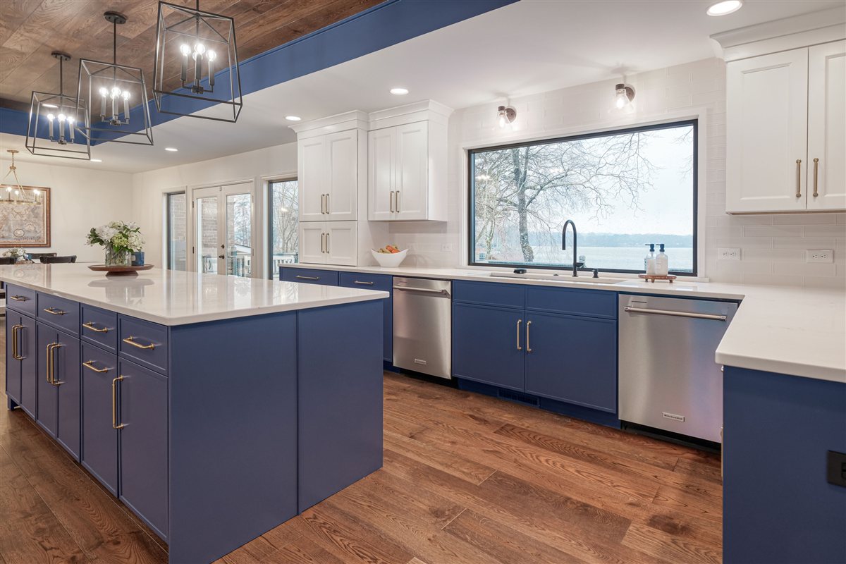 Blue island and window wall with a view, Moss Lake kitchen