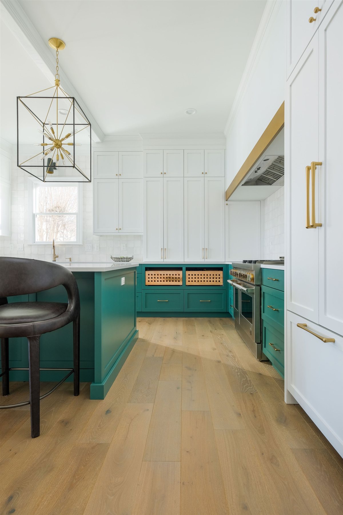 Teal cabinetry and island with leather stools, Lake Wylie kitchen
