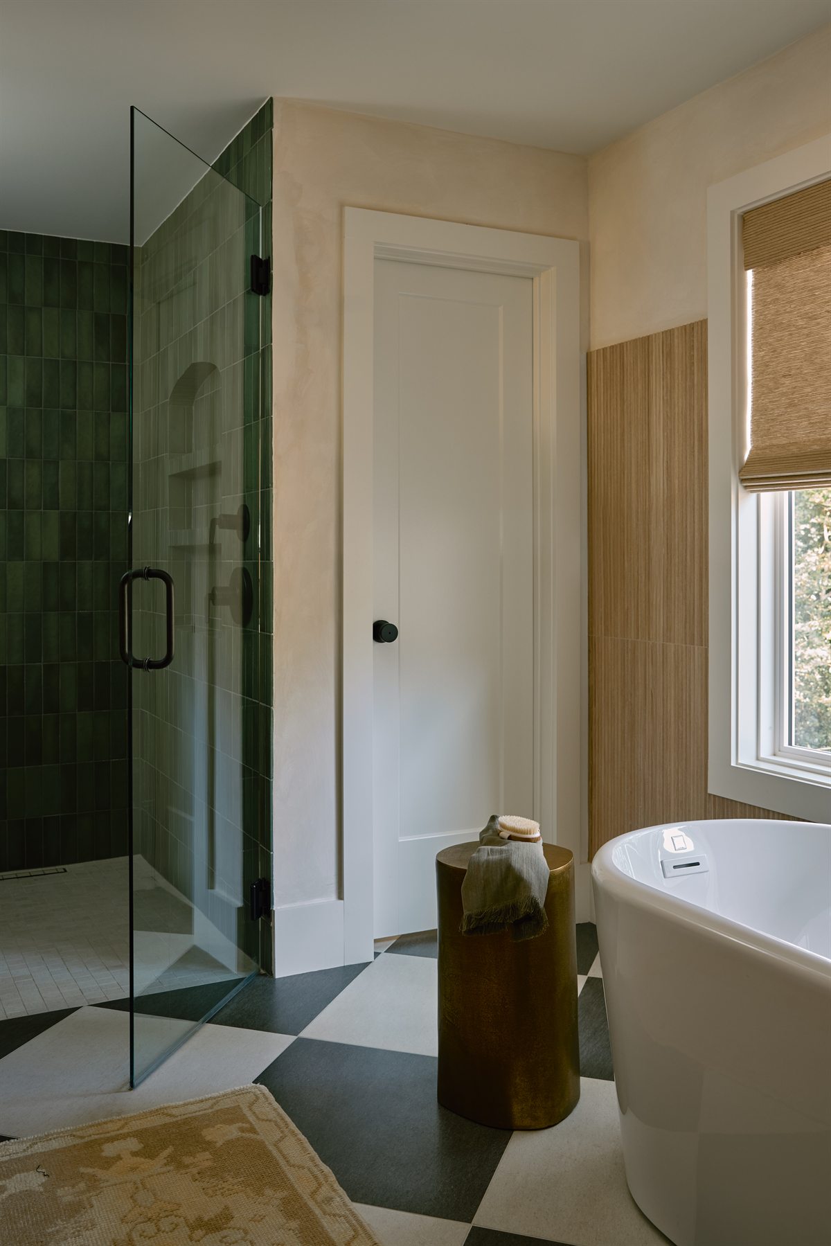 Frameless glass shower beside the freestanding tub and limewashed walls, Lansdowne primary bath, Charlotte