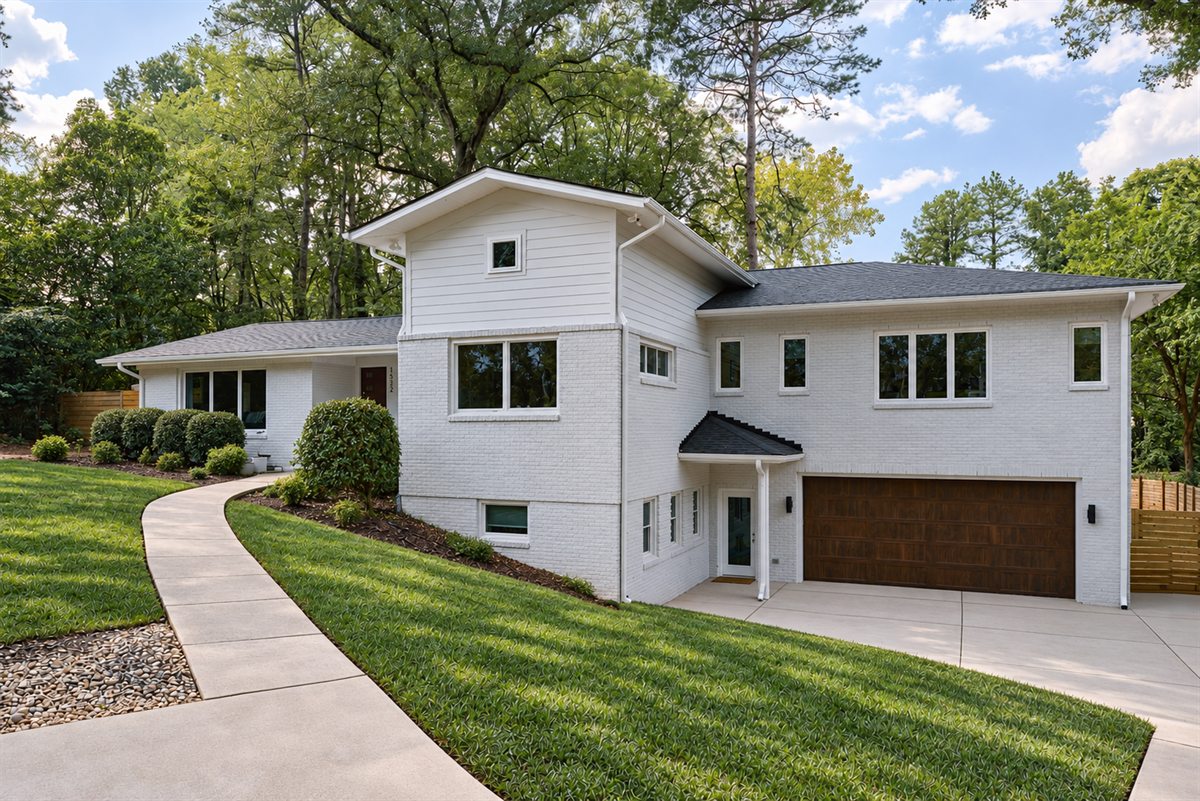 Home addition with a primary suite above a new two-car garage, Lansdowne, Charlotte