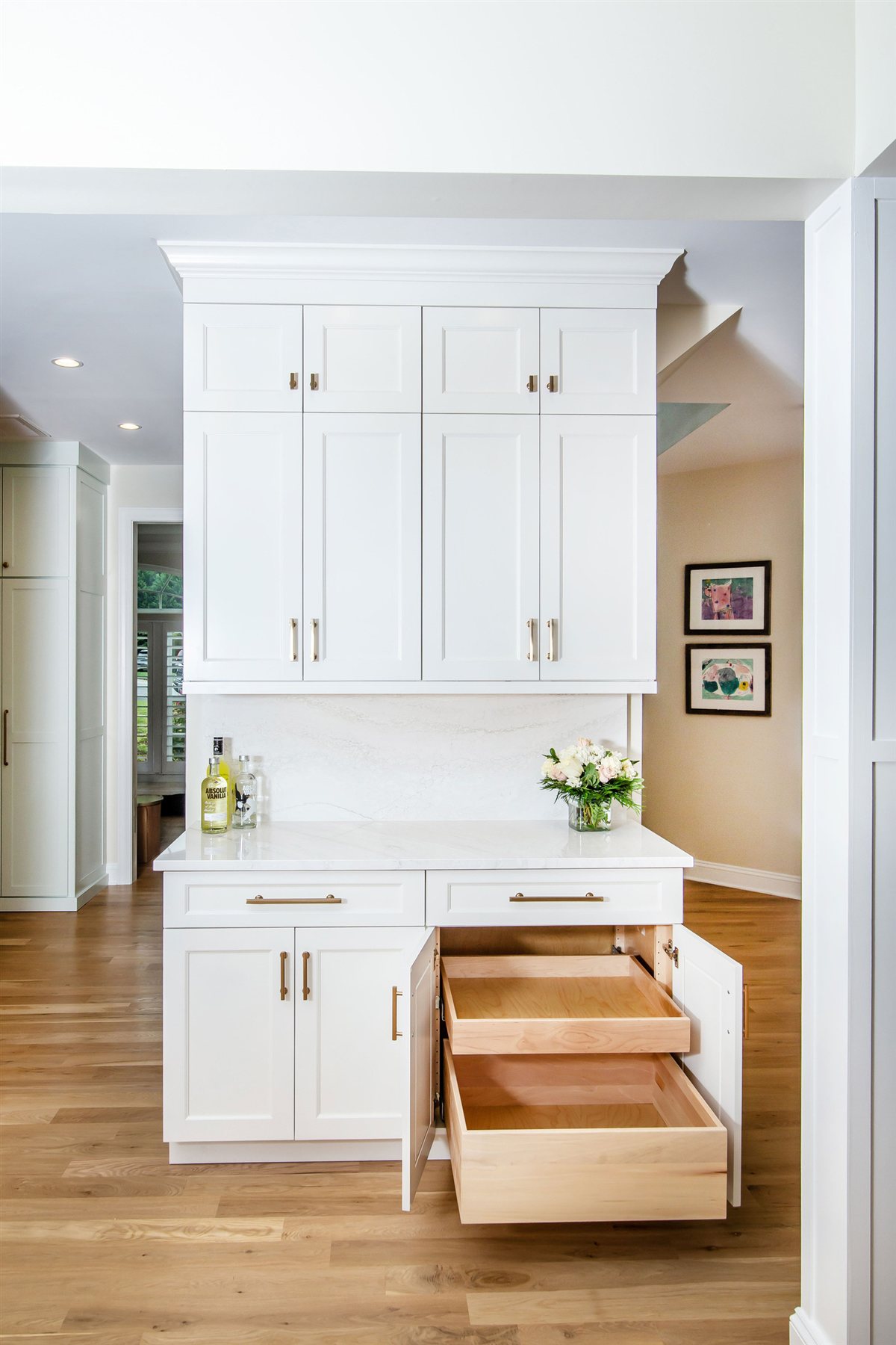 White cabinet wall with a pull-out drawer, Monroe kitchen