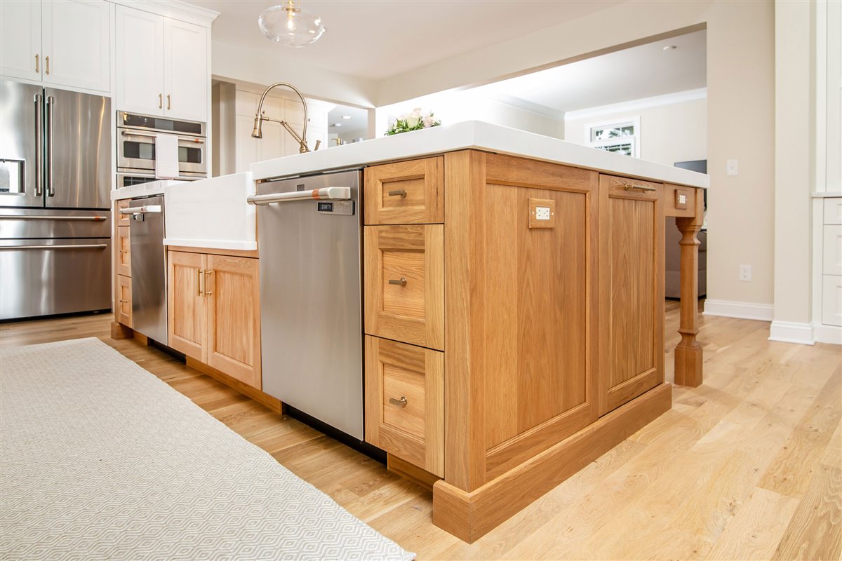 Wood island with a dishwasher and stainless appliances, Monroe kitchen