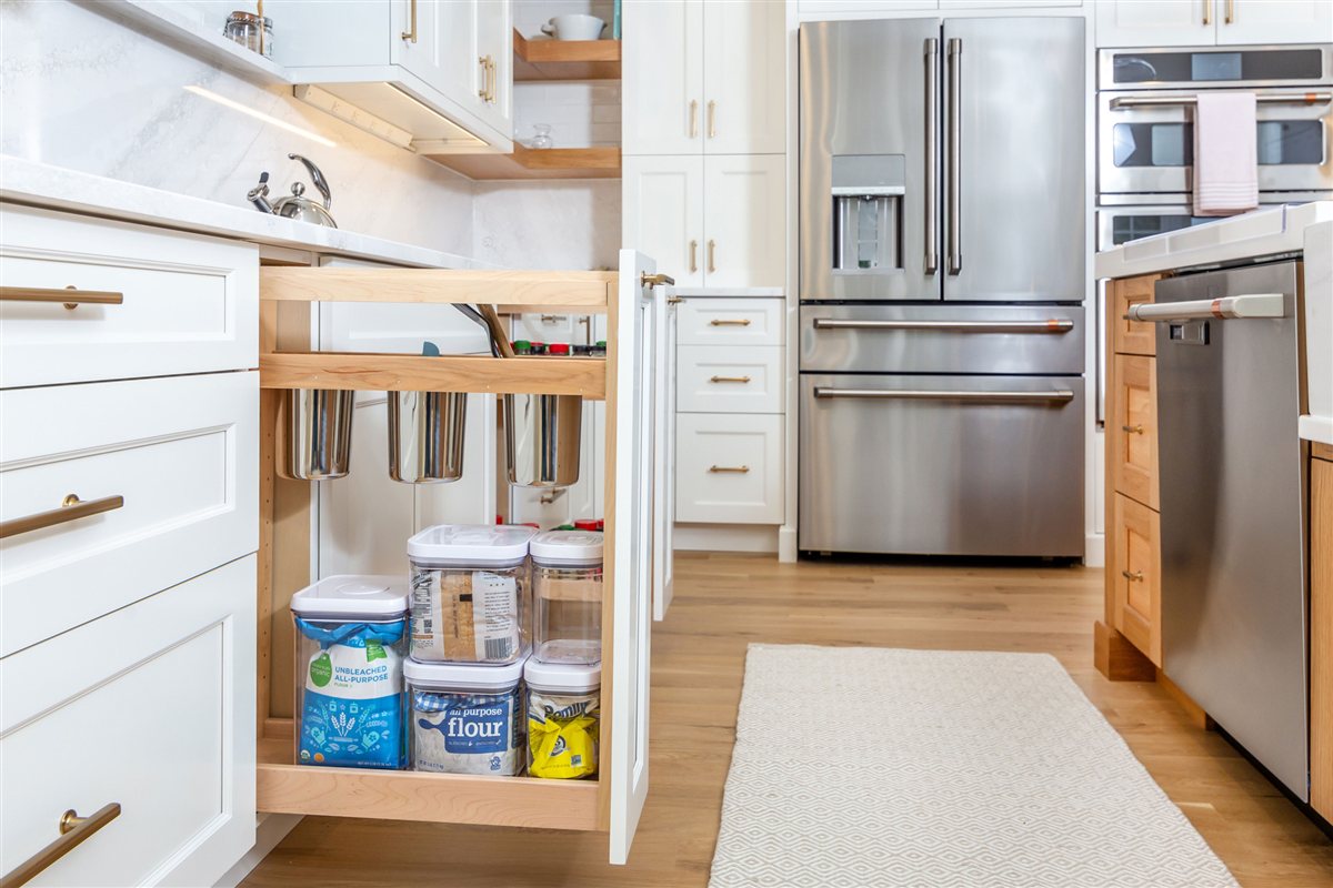 Pull-out pantry cabinet beside the refrigerator, Monroe kitchen