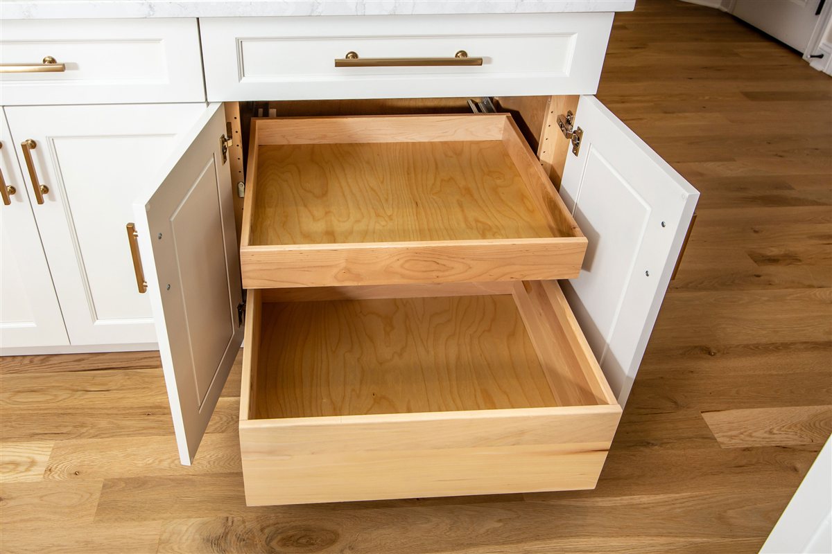 Wood roll-out drawers inside white cabinetry, Monroe kitchen