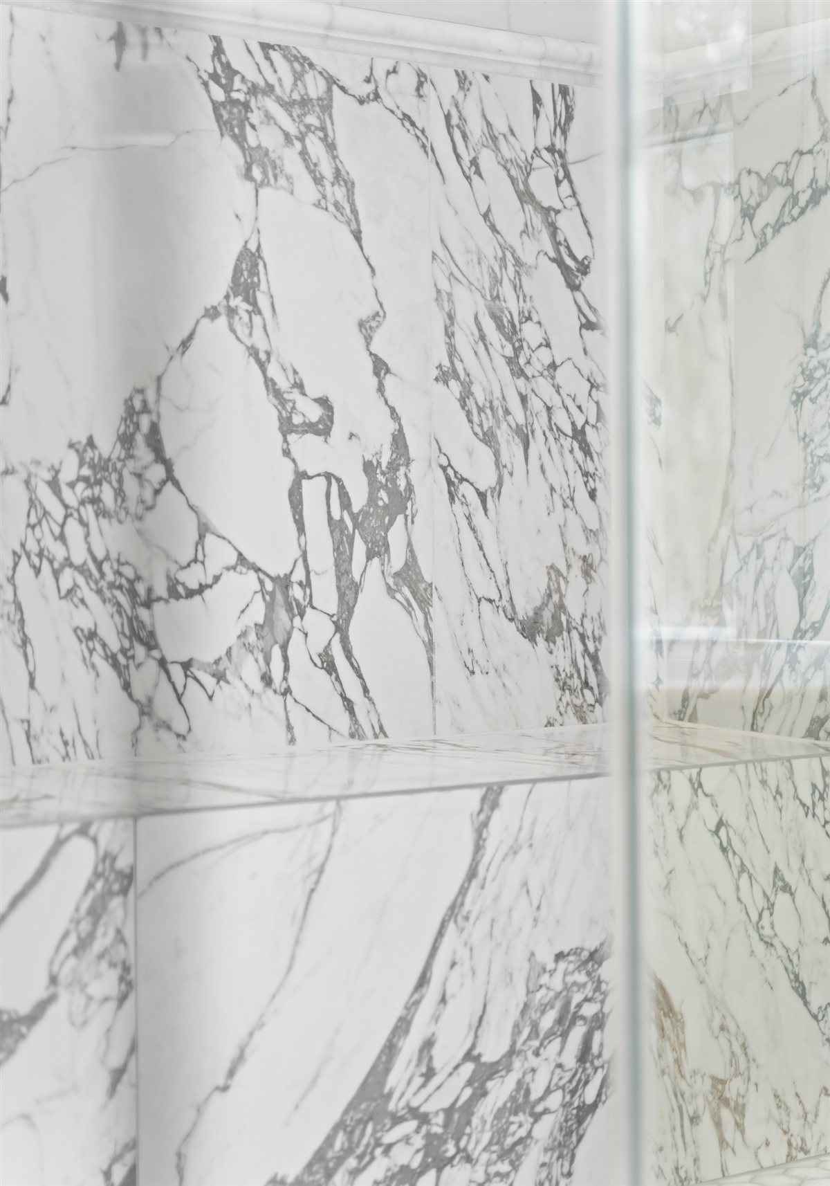 Marble walk-in shower wall, The Point renovation