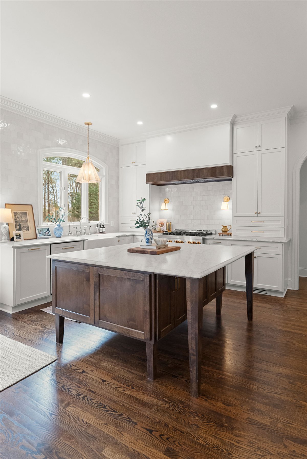 Kitchen island with a dark wood base, The Point renovation