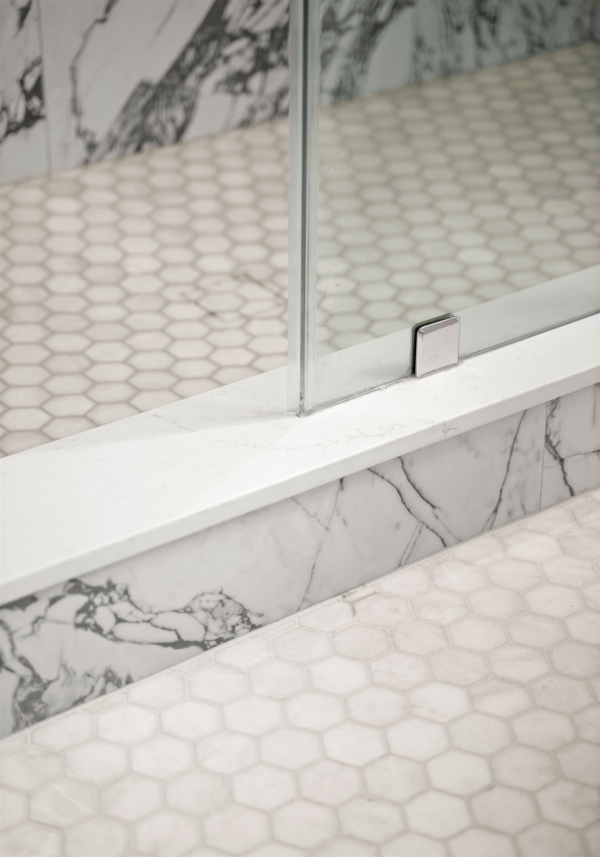 Hexagon tile floor at the shower threshold, The Point renovation