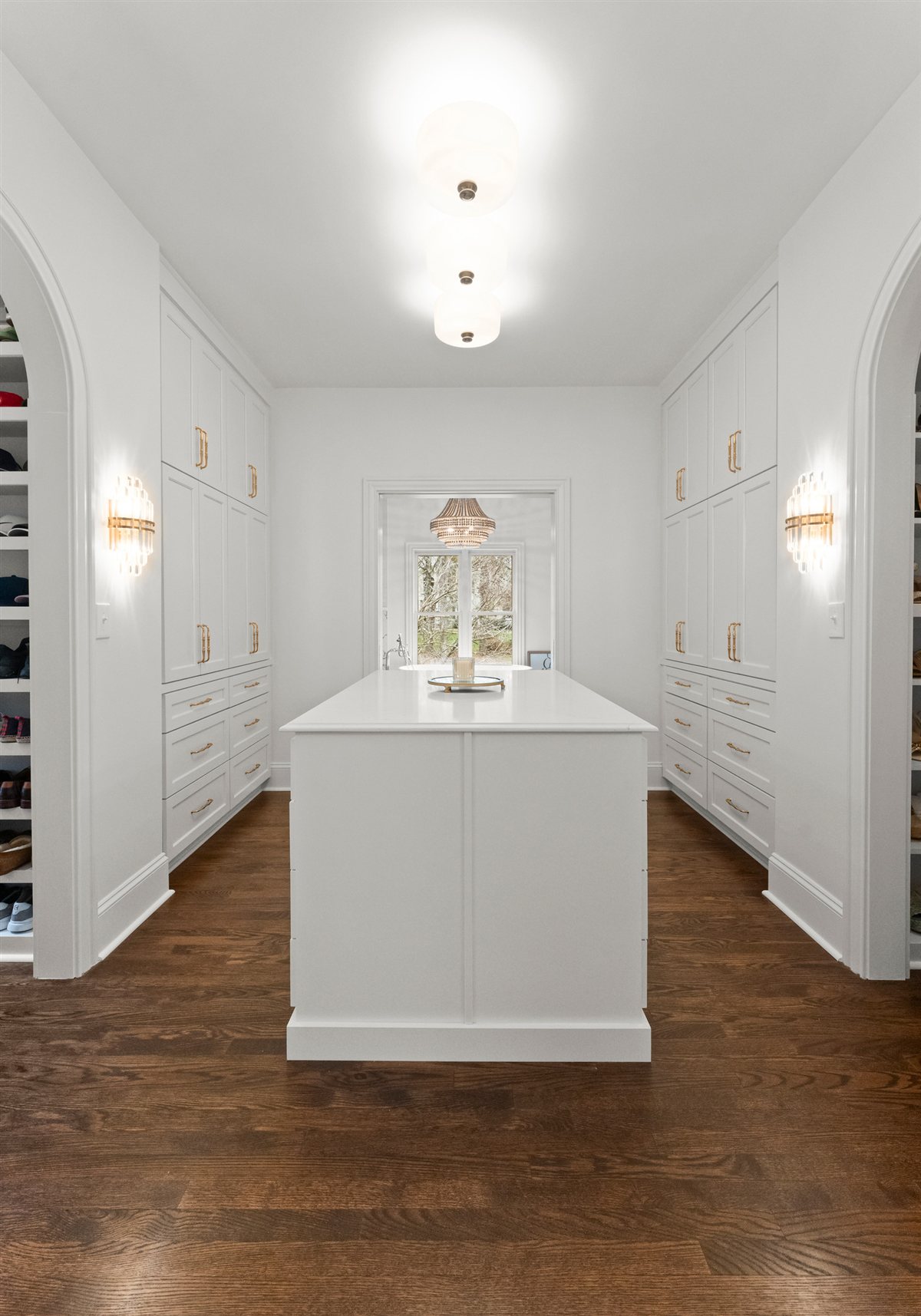 White kitchen with a wood-topped island, The Point renovation