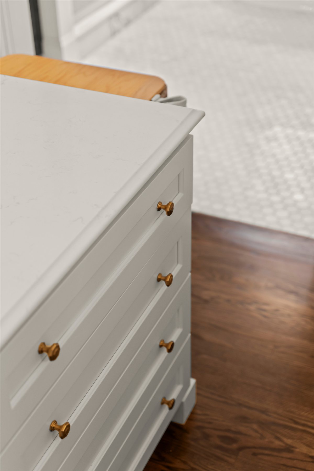 White drawer bank with brass pulls, The Point renovation