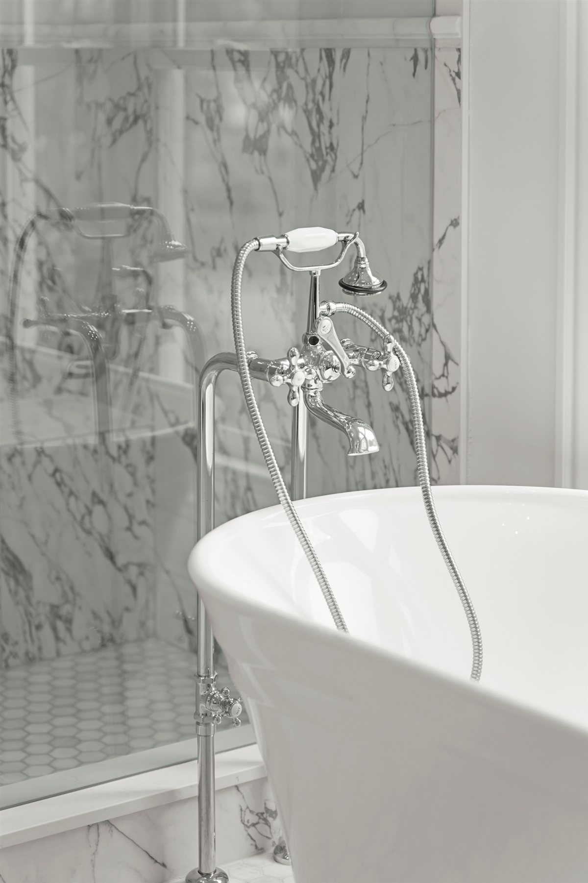Freestanding tub and marble shower wall, The Point renovation