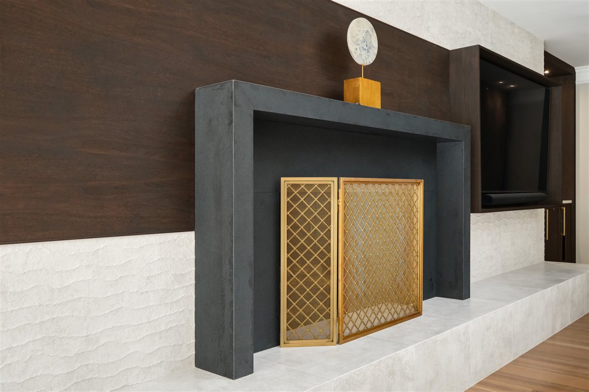 Charcoal fireplace surround with a brass screen, Pellyn Wood renovation