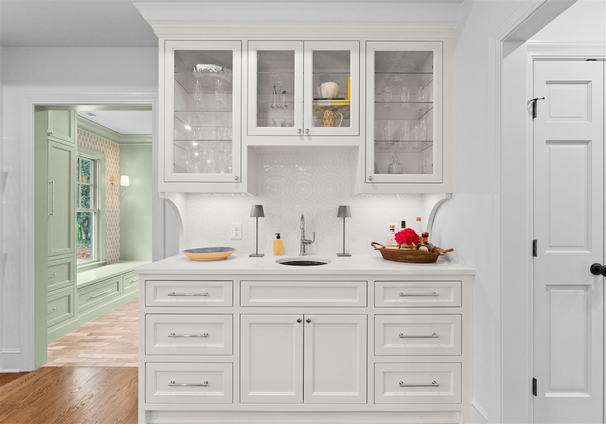 Built-in glass-front cabinets beside the mudroom doorway, Providence Park historic home