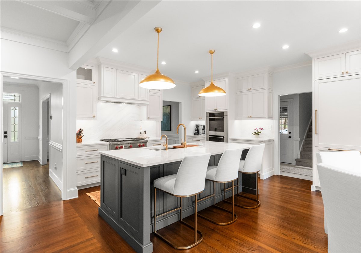 White kitchen with a charcoal island and coffered ceiling, Providence Plantation kitchen