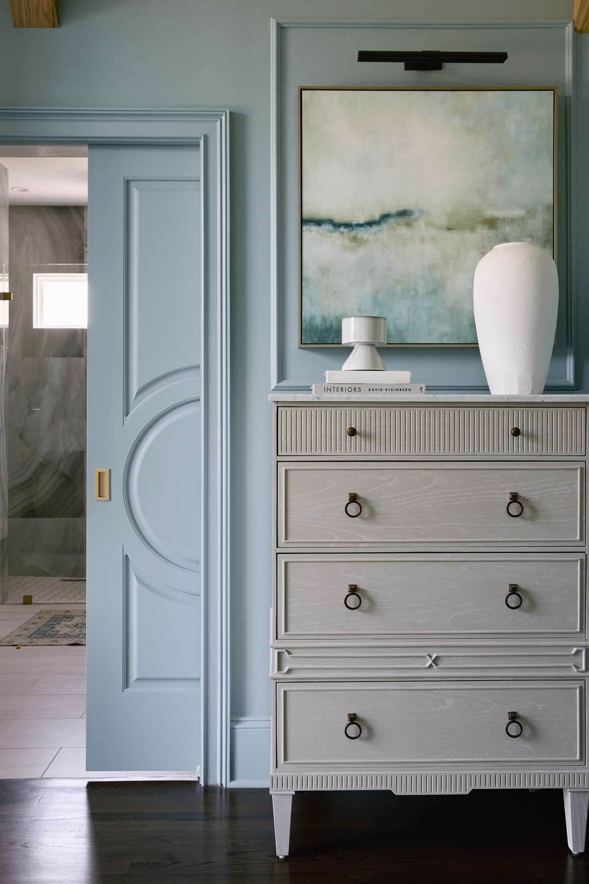 Custom pocket door into the renovated primary bath, Providence Springs, Charlotte