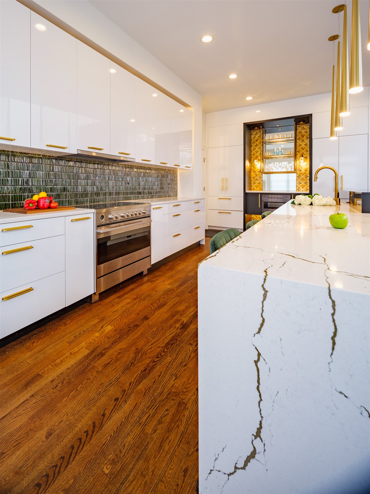 Quartz waterfall island and range wall, SouthPark kitchen