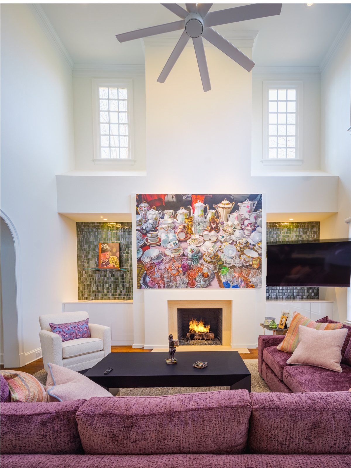 Living room fireplace wall with artwork, SouthPark renovation