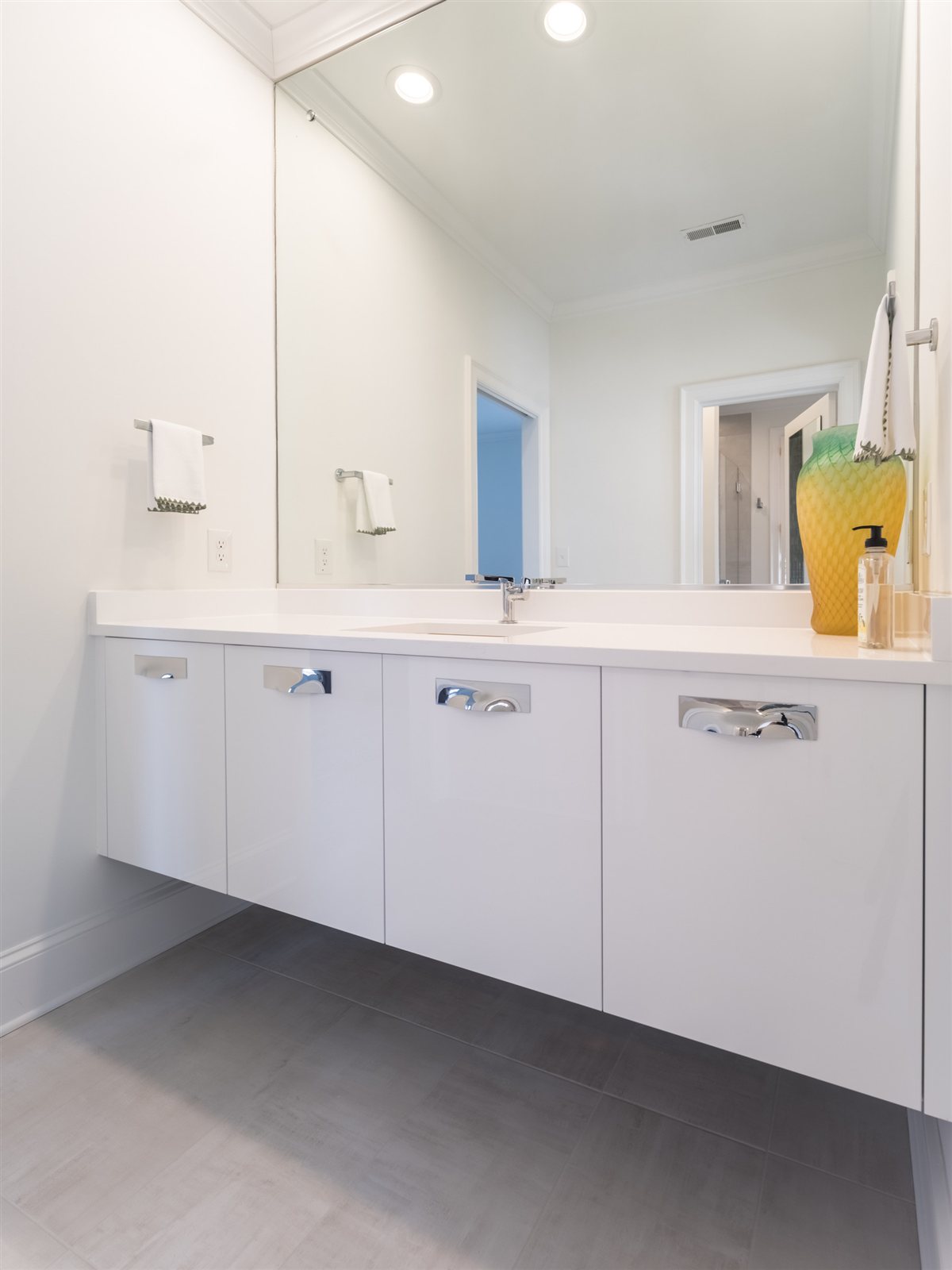 White floating vanity, SouthPark renovation