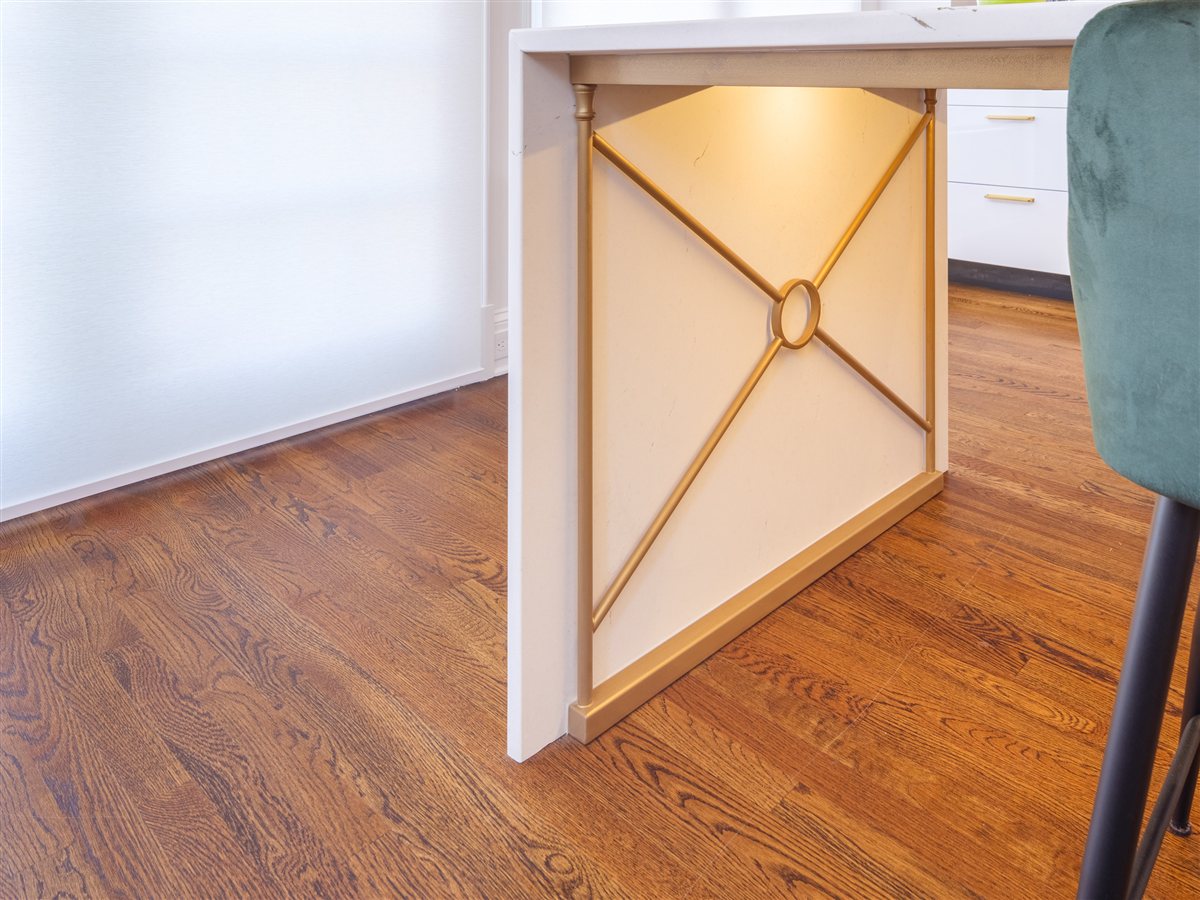 Island end panel with a brass X inlay, SouthPark kitchen