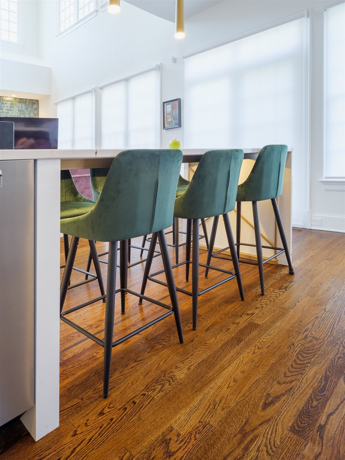 Teal stools at the kitchen island, SouthPark kitchen