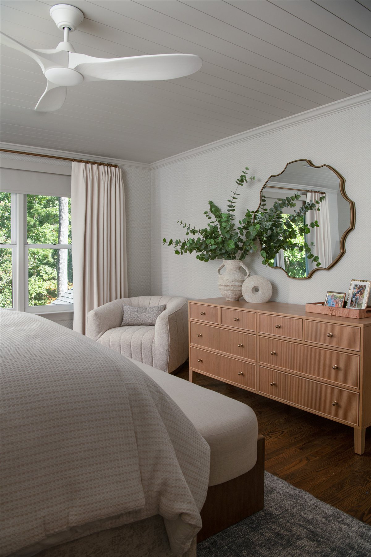 Bedroom sitting area with a wood dresser and ceiling fan, Valencia Terrace addition