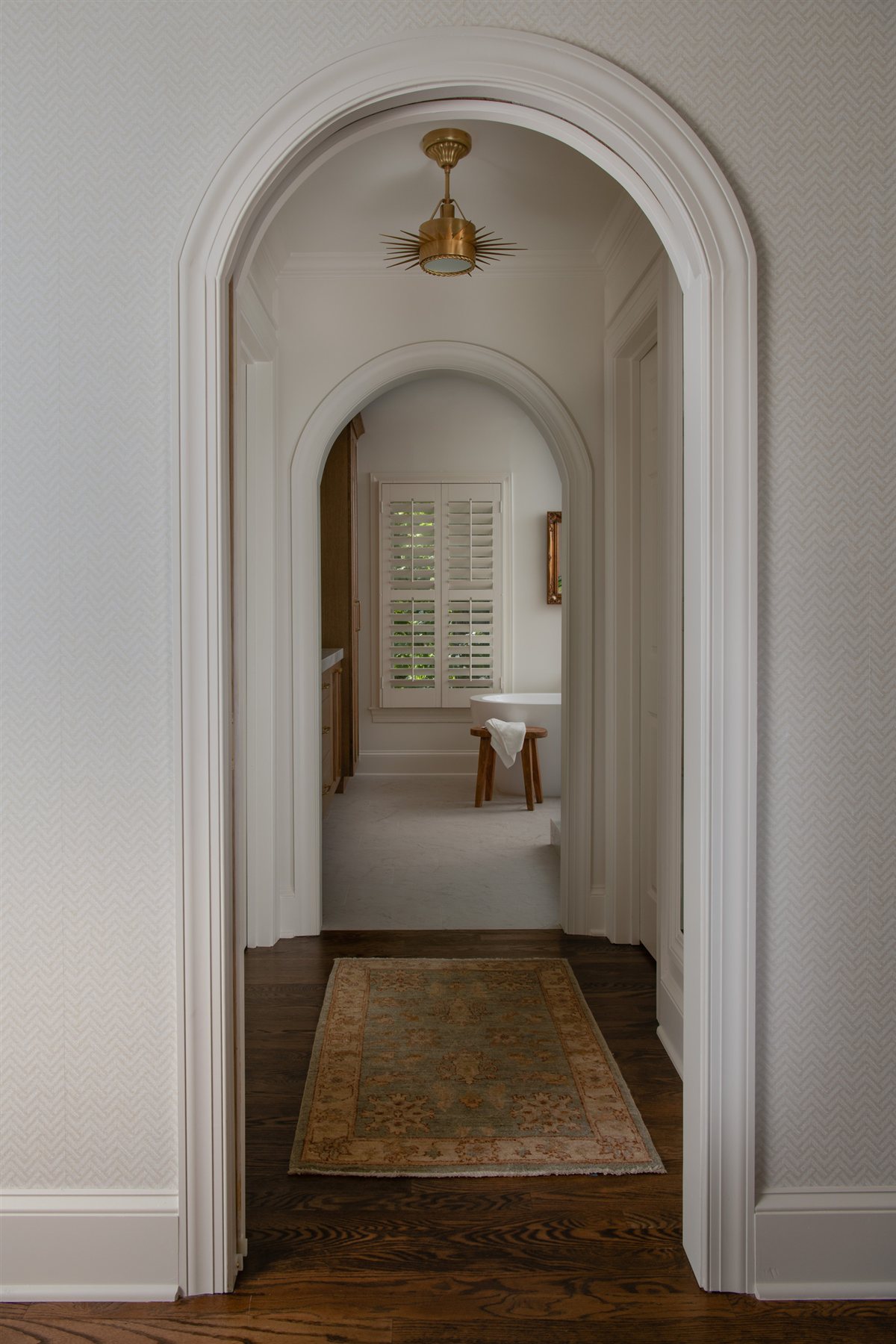 Arched hallway leading to the primary bath, Valencia Terrace addition