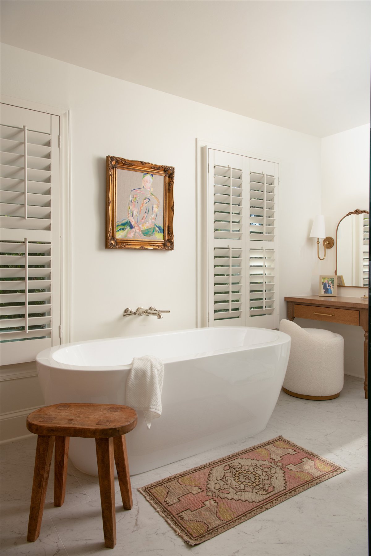 Primary bath with a freestanding tub and plantation shutters, Valencia Terrace addition