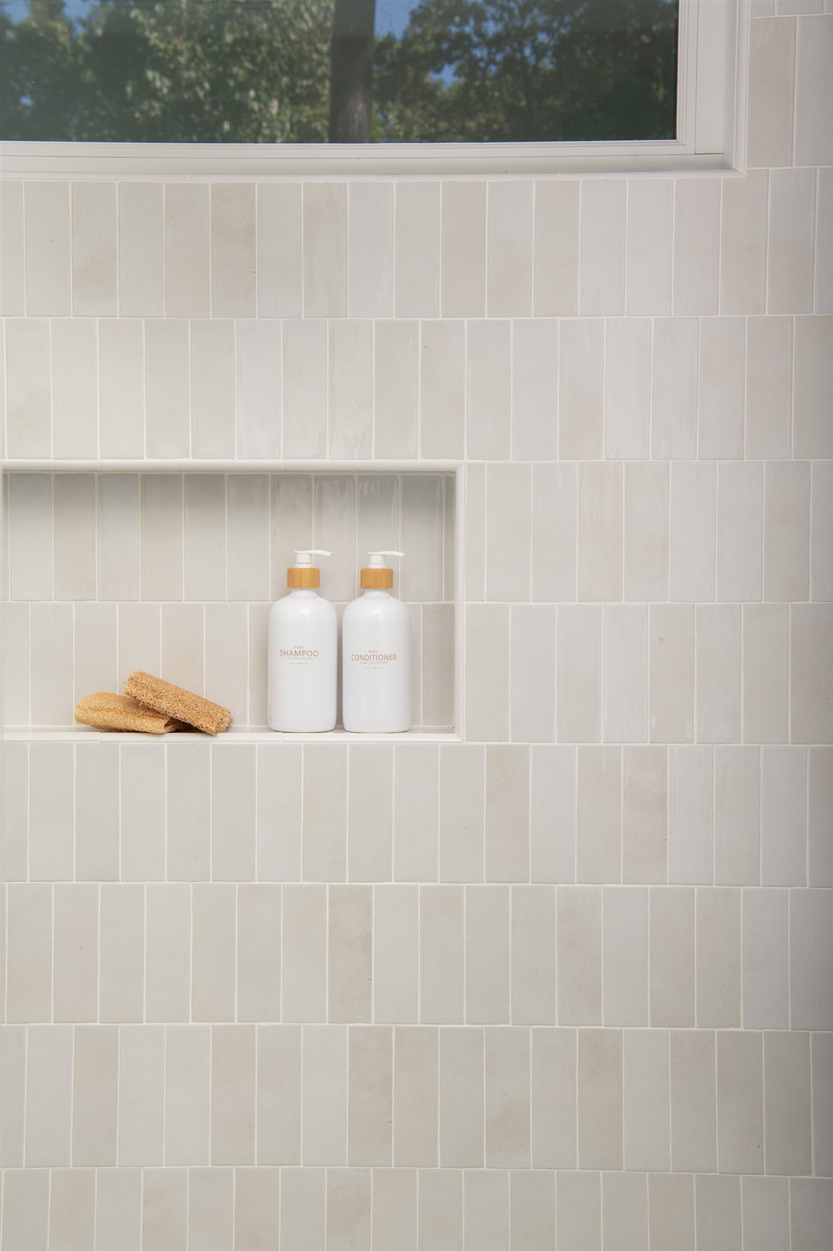 Tiled shower niche with bath products, Valencia Terrace renovation