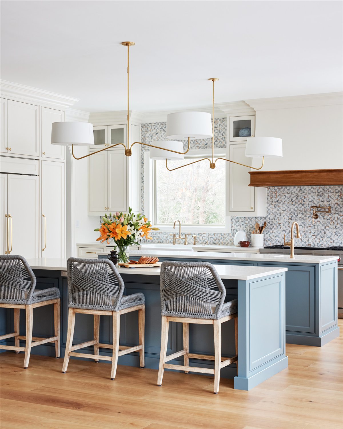 Blue kitchen island and patterned tile backsplash, Waxhaw renovation