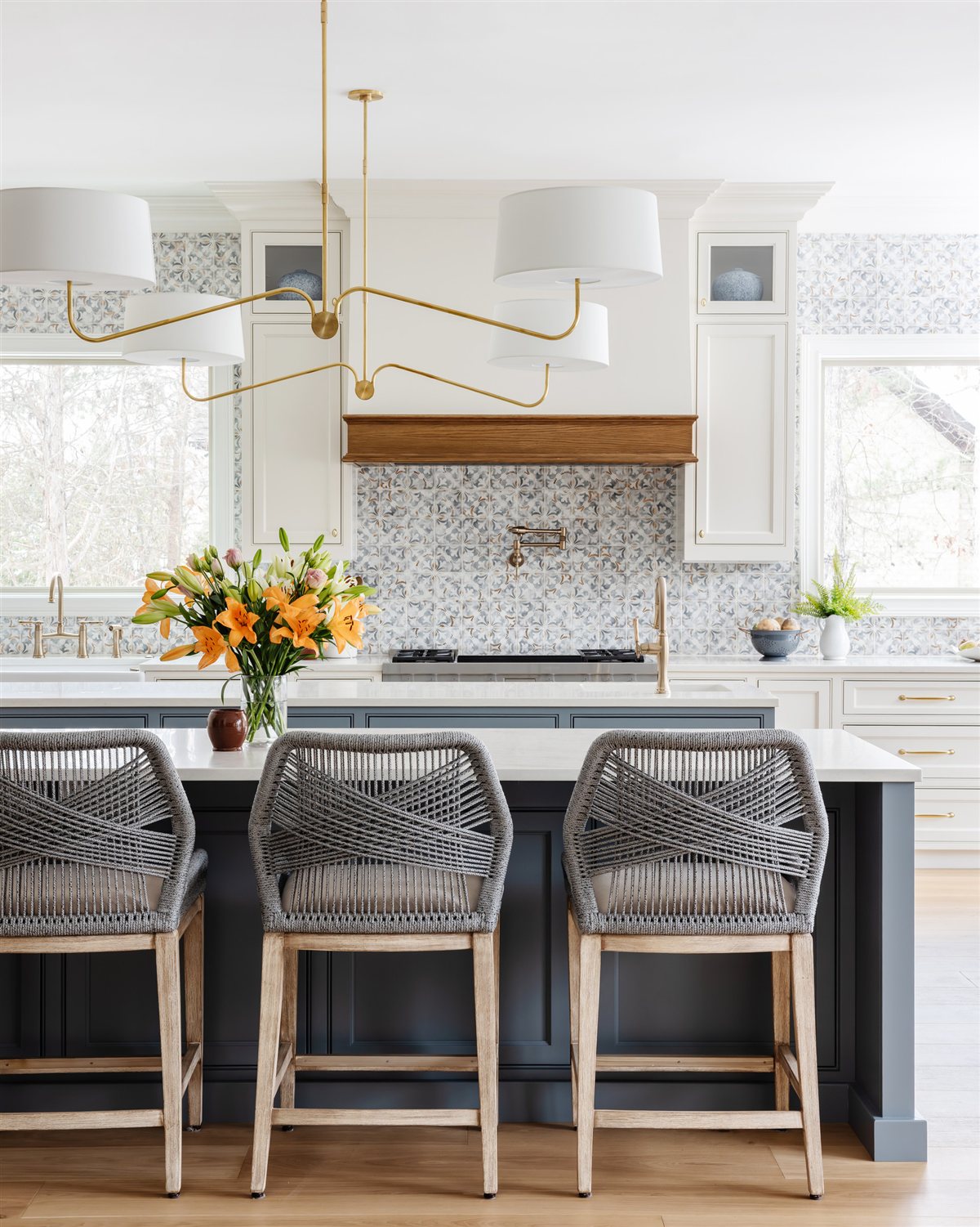 Kitchen island seating with a flower arrangement, Waxhaw renovation