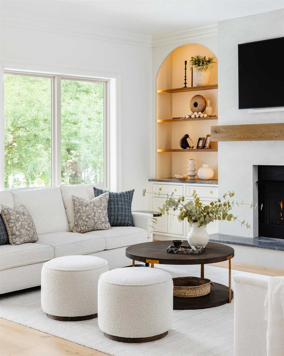 Family room with arched shelving on each side of the fireplace, Waxhaw renovation
