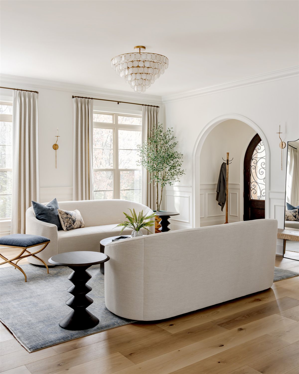Living room seating area beside the arched front door, Waxhaw renovation