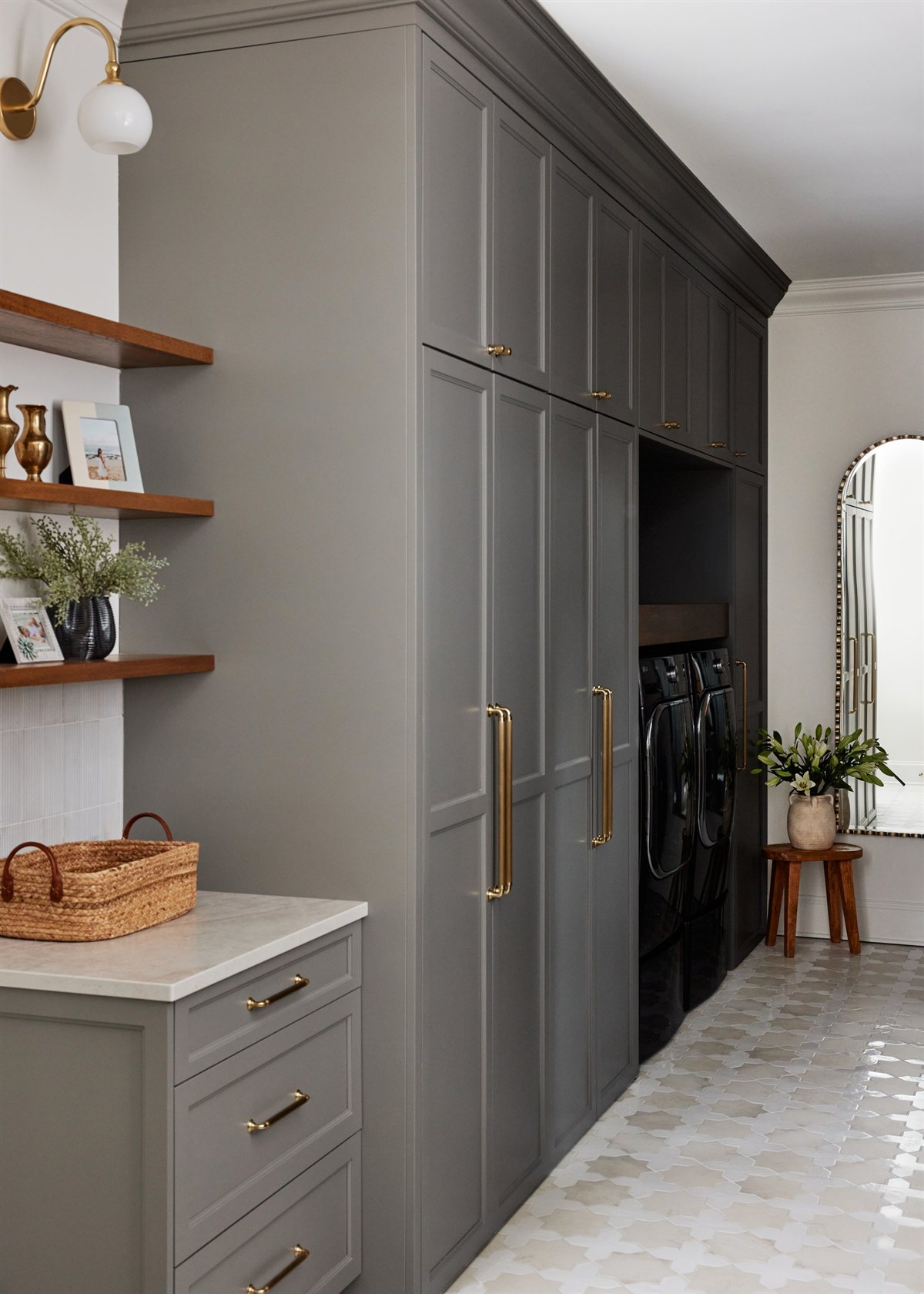 Mudroom with gray cabinetry and wood floating shelves, Waxhaw renovation